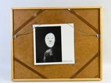 a black and white photo of a woman in a picture frame