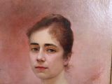 portrait of a woman in a white dress with a pink background