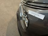 a close up of a car with a sticker on it ' s hood