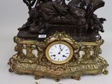 a clock that is sitting on top of a table