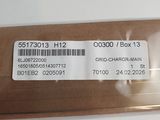 a brown box with a barcode on it on a white table