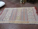 un tapis qui se trouve sur le sol d'une pièce