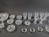 a lot of glass items that are on the table