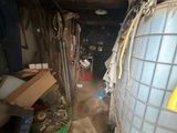 an image of a room that has a lot of stuff in it