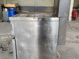 an image of a commercial fryer sitting on a pallet