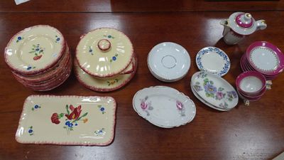 a table with a lot of plates and bowls on it
