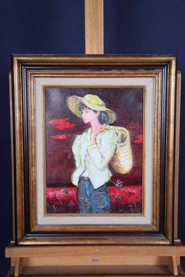 a painting of a woman in a straw hat on a easel