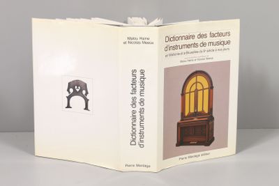 a book with a picture of an old clock inside of it