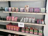 a lot of makeup products on the shelves in the store