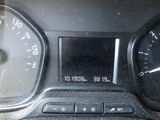 a close up of the dashboard of a car with a speedometer