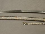 an image of a sword with a chain attached to it