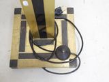 an image of a gold and black electronic device