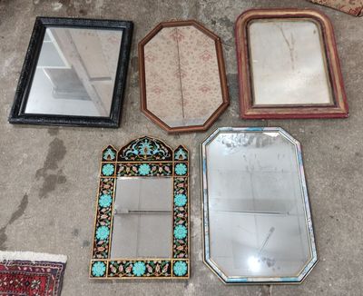 many mirrors and a rug on the floor next to each other