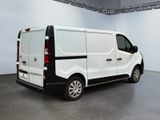 a white van that is parked in a large room