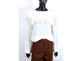 white blouse with ruffles and brown pants on mannequin head