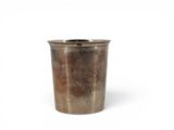 an image of a metal cup with a handle on a white background
