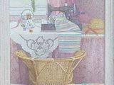 a picture of a painting of a basket with a cat on it