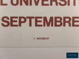 a sign that says el university de septubre on it