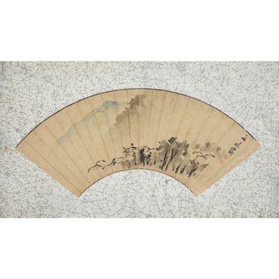an oriental fan with a painting of a mountain scene on it