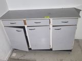 a white cabinet with two doors and a yellow sticker on it