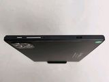 a close up of the back of a black laptop computer
