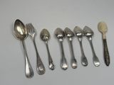five spoons and six spoons on the table