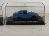 two models of a blue car in a display case