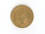 une pièce d'or sur laquelle est représentée une tête d'Indien