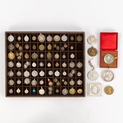 a box of coins and a box of coins on a white surface
