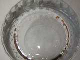 a close up of a glass of water on a table