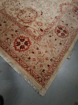 a large rug on the floor in a room