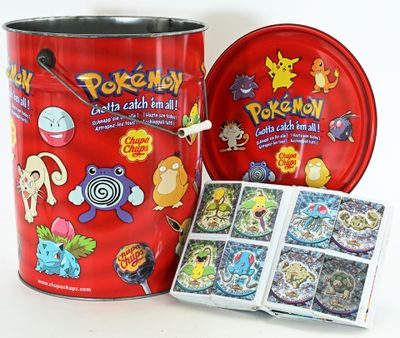 a tin of pokemon candy and a tin of candies