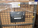 a metal cart with boxes on top of it in a warehouse
