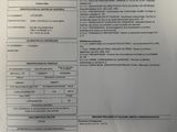 gros plan d'une feuille de papier portant un code-barres