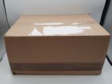 a cardboard box sitting on top of a white table