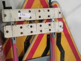 a sign that says pro plus on it next to a ladder