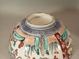 a picture of a vase that is on display on a table