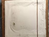 a close up of a mirror on a wall with dirt on it