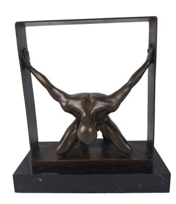 bronze sculpture of a female nude torso on a black base