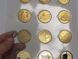a person that is holding some gold coins in their hand