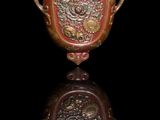 an image of a vase with a dragon on it