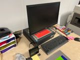 a desktop computer sitting on a desk with a keyboard and mouse