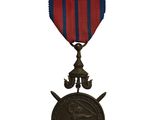 gros plan d'une médaille sur fond blanc