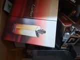 a box of perfumes that are sitting on top of a table
