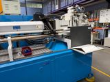 an image of a machine that is working on a piece of paper