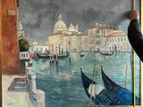 painting of a view of venice with gondolas in the foreground