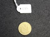 an image of a gold coin with a price tag on it