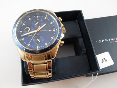 a watch that is in a box on the table