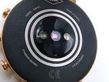 a close up of a wrist watch with a camera on it