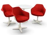 deux chaises rouges et une table blanche posées sur un sol blanc